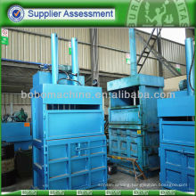 Textile waste baling press